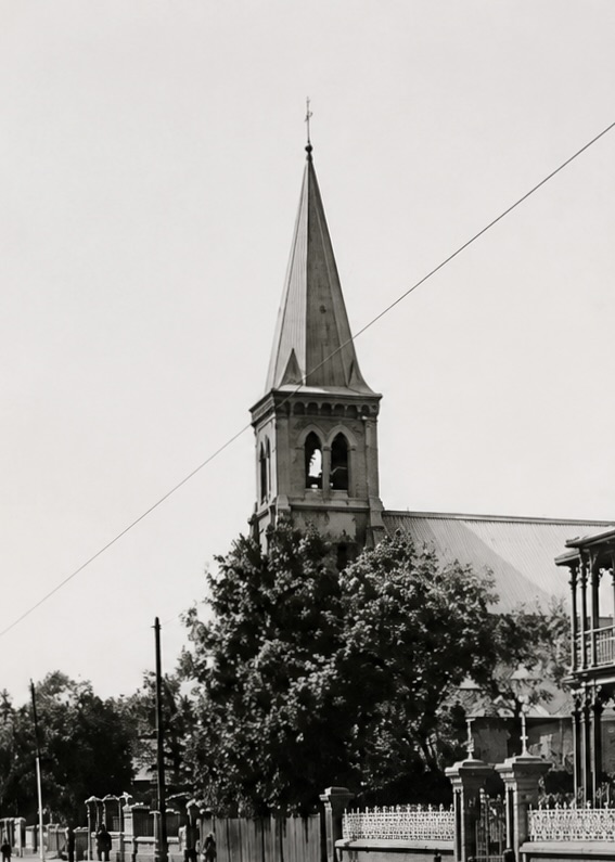 St Mary’s Church in Kimberley between 1912 and 1938, showing the masonry bell tower beside the earlier timber-and-iron nave.
