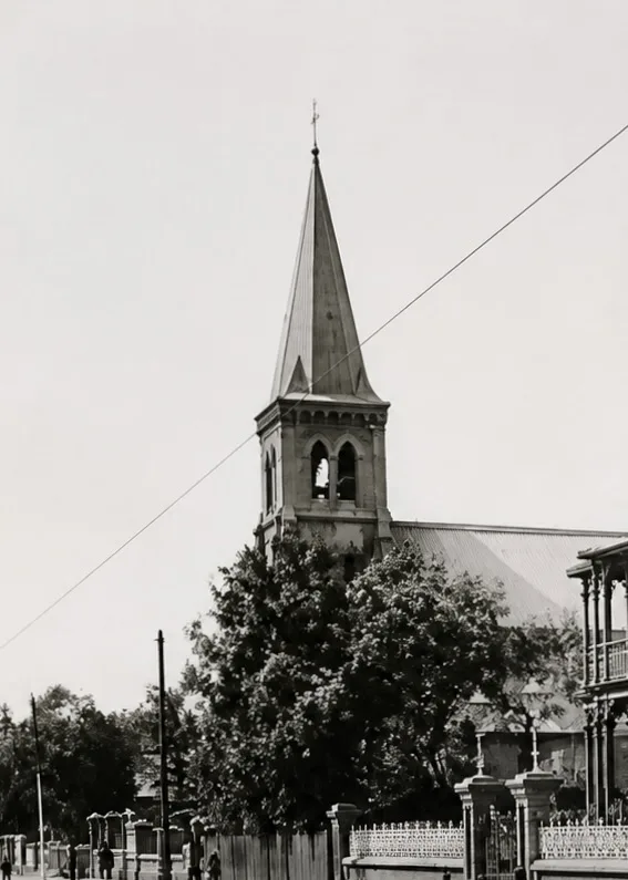 St Mary’s Church in Kimberley between 1912 and 1938, showing the masonry bell tower beside the earlier timber-and-iron nave.