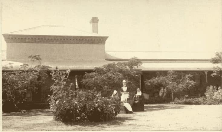Nurses in the garden outside Kimberley Hospital circa 1900