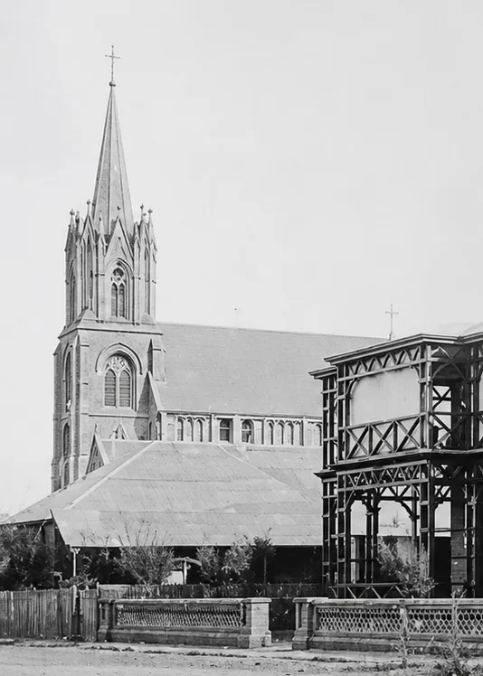 Historic St Mary’s Church in Kimberley with its original pointed Gothic Revival timber-and-iron steeple and wood-and-iron nave before the tower was replaced in 1912.