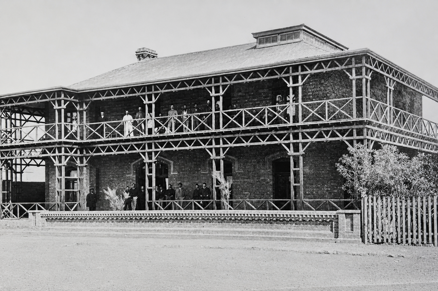Kimberley Club patrons pose for a photo on the verandah of the original building.