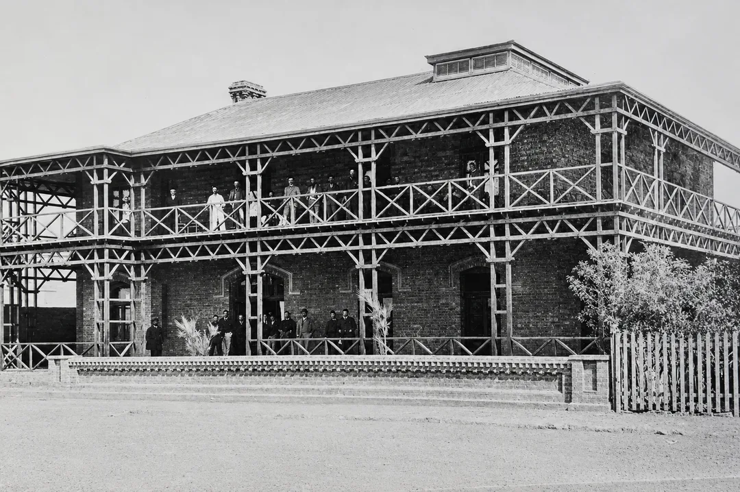 Kimberley Club patrons pose for a photo on the verandah of the original building.