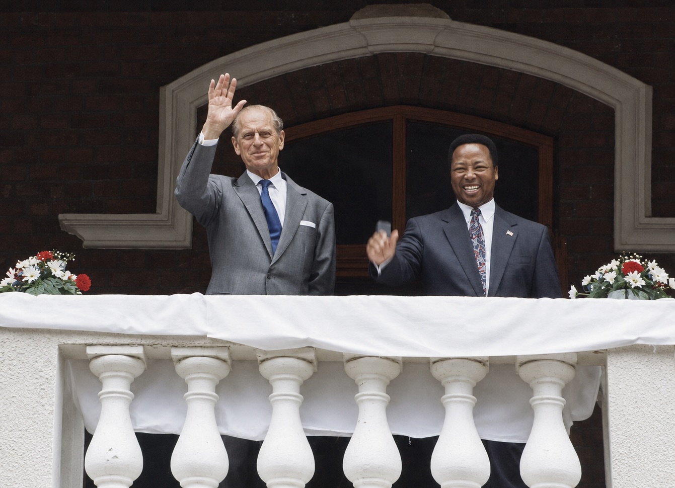 Prince Philip, Duke of Edinburgh, with Northern Cape Premier Manne Dipico on the balcony of the Kimberley Club during his Kimberley visit on 22 March 1995.