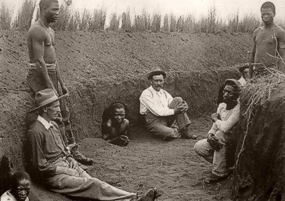Waiting in a redoubt. 
In warfare, a redoubt is an isolated, fortified emplacement. It is typically built rapidly using earthworks, stone, or timber to defend a specific location.