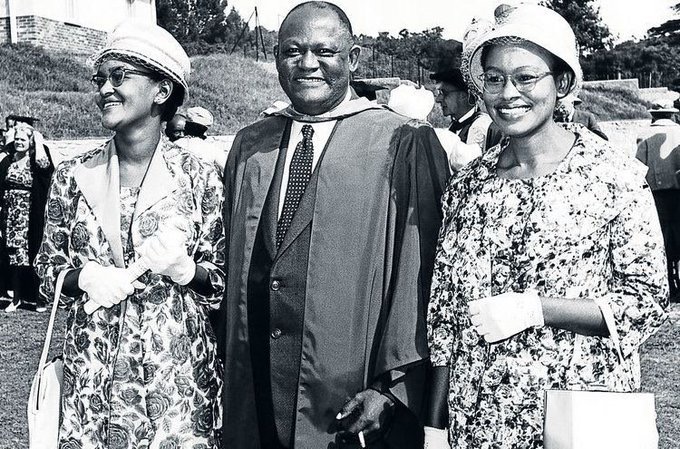 Professor Z.K. Matthews standing with his daughters during a University of Fort Hare graduation ceremony in 1961.