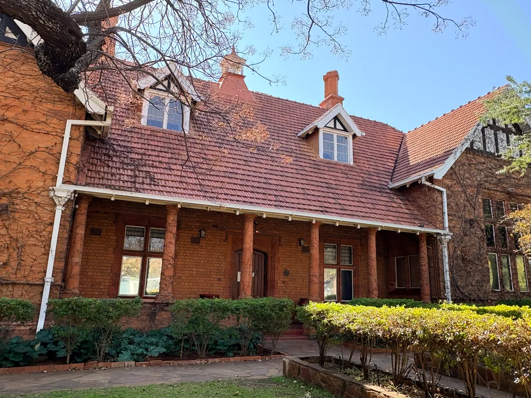 The long red-brick façade reveals Daniel Westwood Greatbatch's careful attention to proportion and detail.