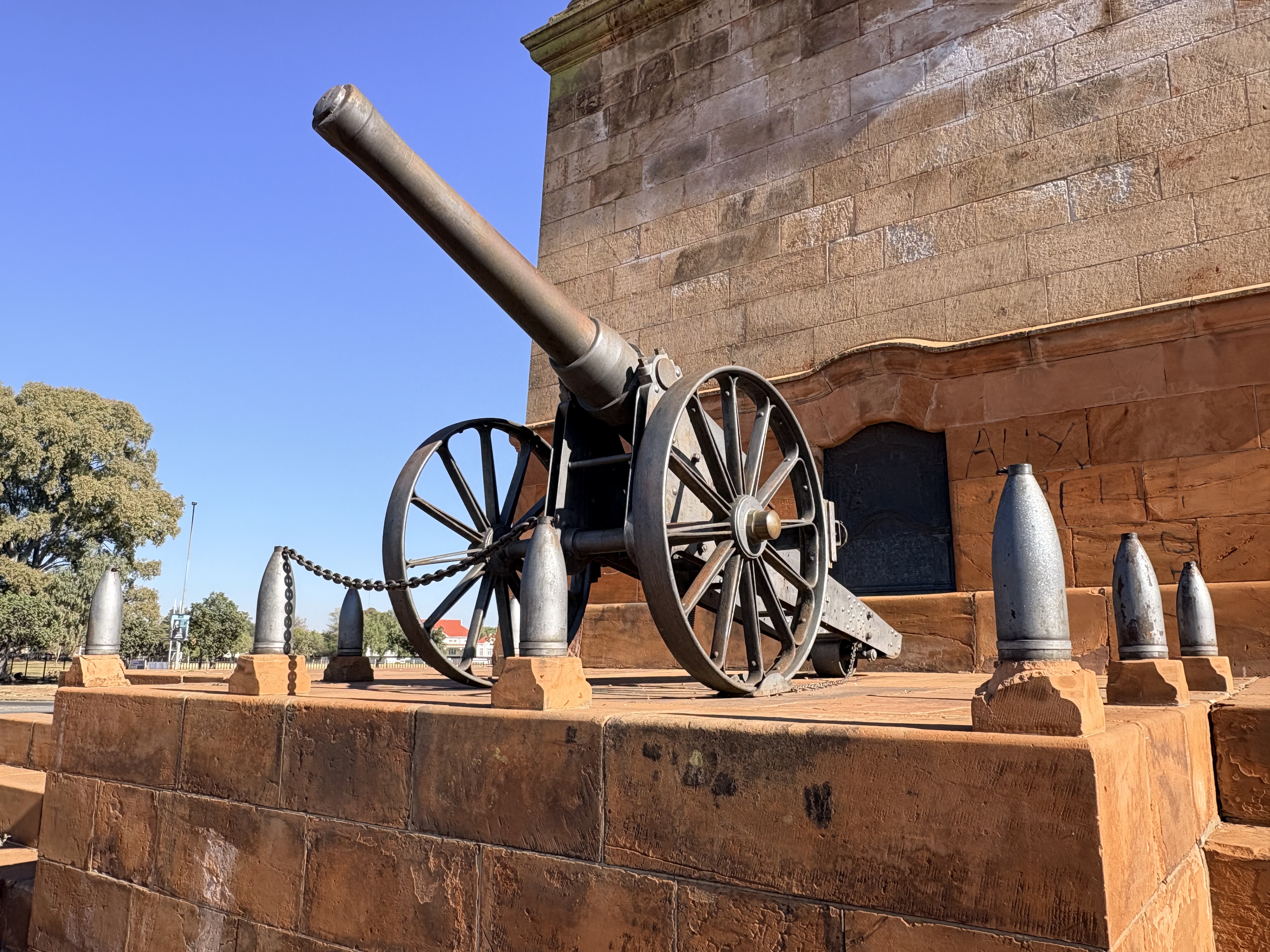 Eastern view of the Honoured Dead Memorial in Kimberley with Long Cecil displayed prominently on the sandstone stylobate below Sir Herbert Baker's classical memorial.