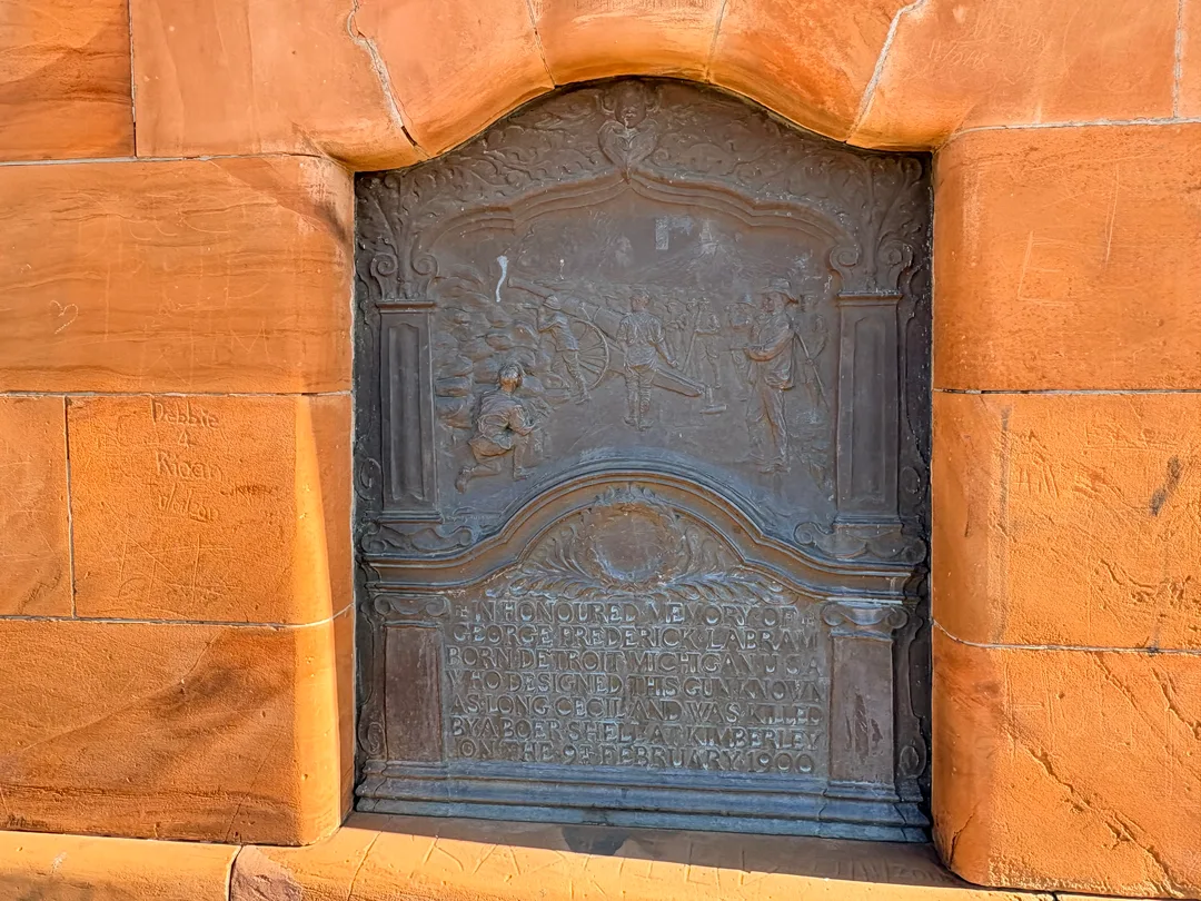 Bronze memorial plaque honouring George Frederick Labram, chief designer of Long Cecil, located behind the gun at the Honoured Dead Memorial in Kimberley. The plaque was designed by John Lockwood Kipling, Rudyard Kipling's father.
