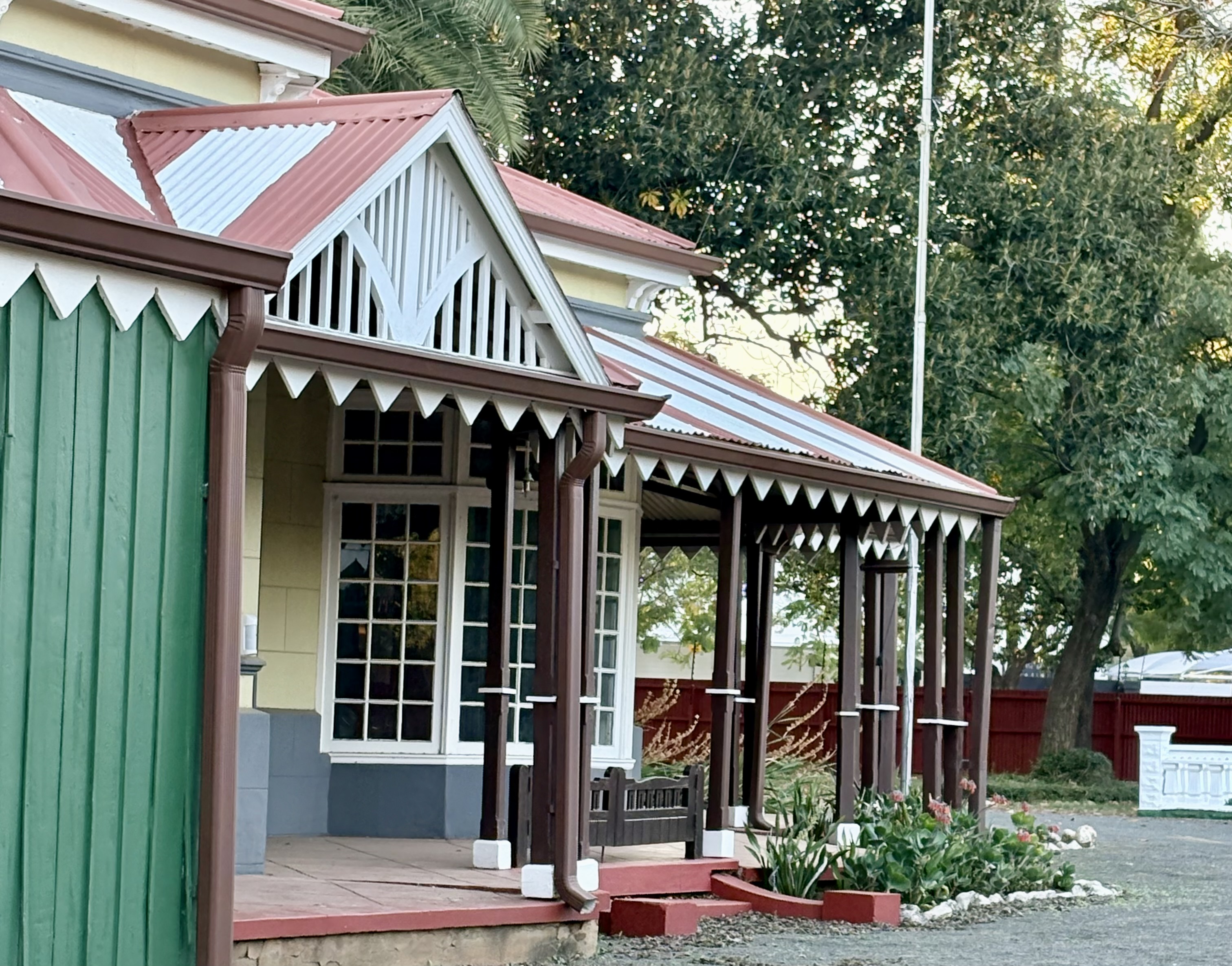 Front elevation of Rudd House showing verandahs and Victorian architecture.