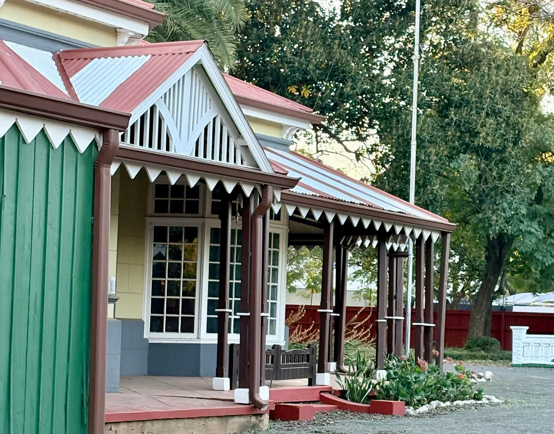 Front elevation of Rudd House showing verandahs and Victorian architecture.