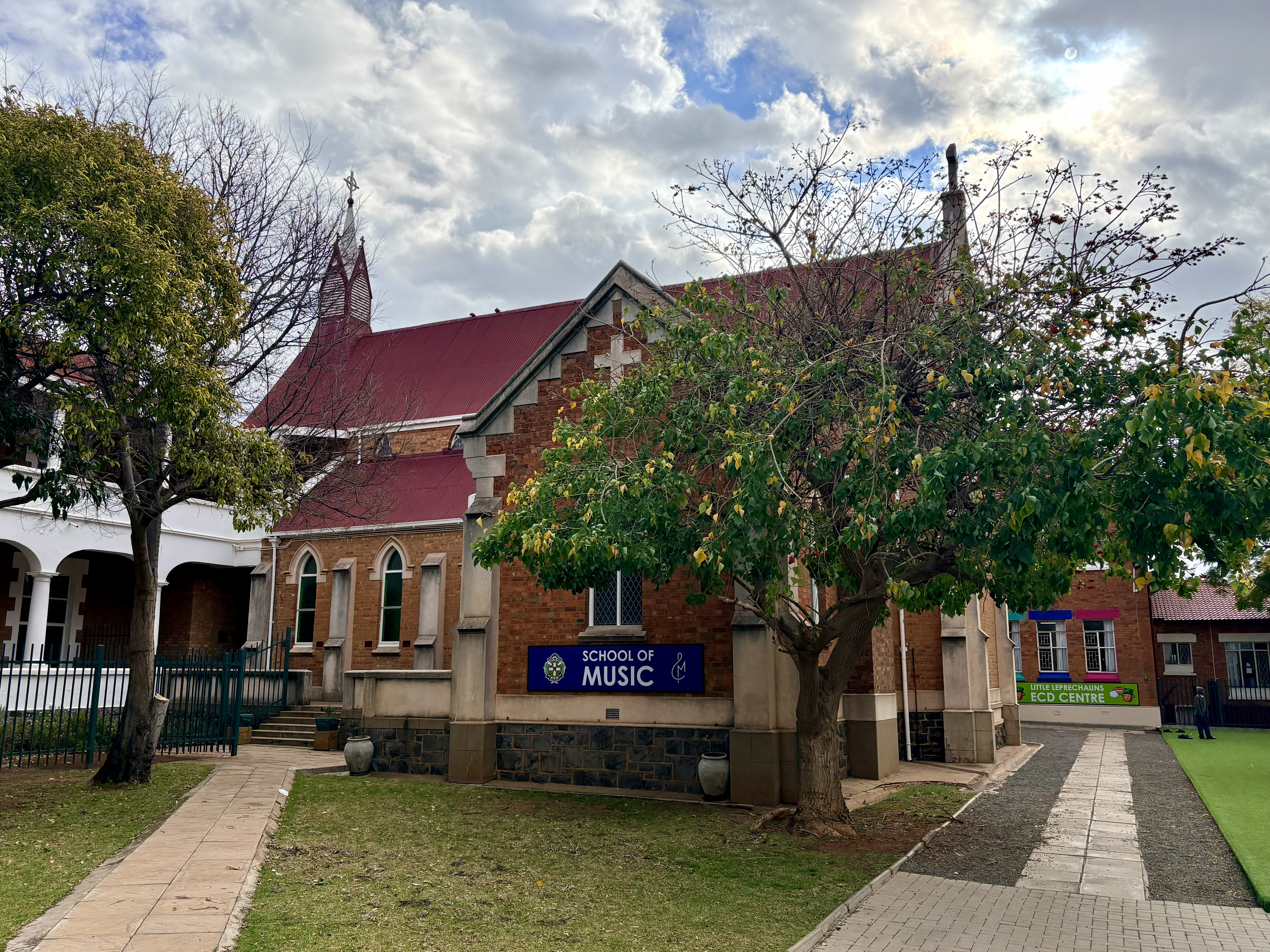 Historic Nazareth House Chapel at St Patrick's CBC in Kimberley, showing the red-brick chapel building and the St Patrick's CBC School of Music sign.