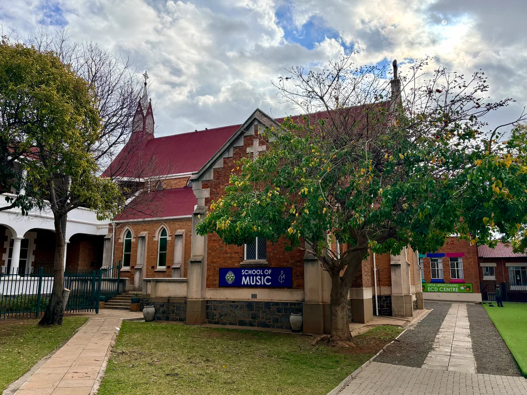 Historic Nazareth House Chapel at St Patrick's CBC in Kimberley, showing the red-brick chapel building and the St Patrick's CBC School of Music sign.