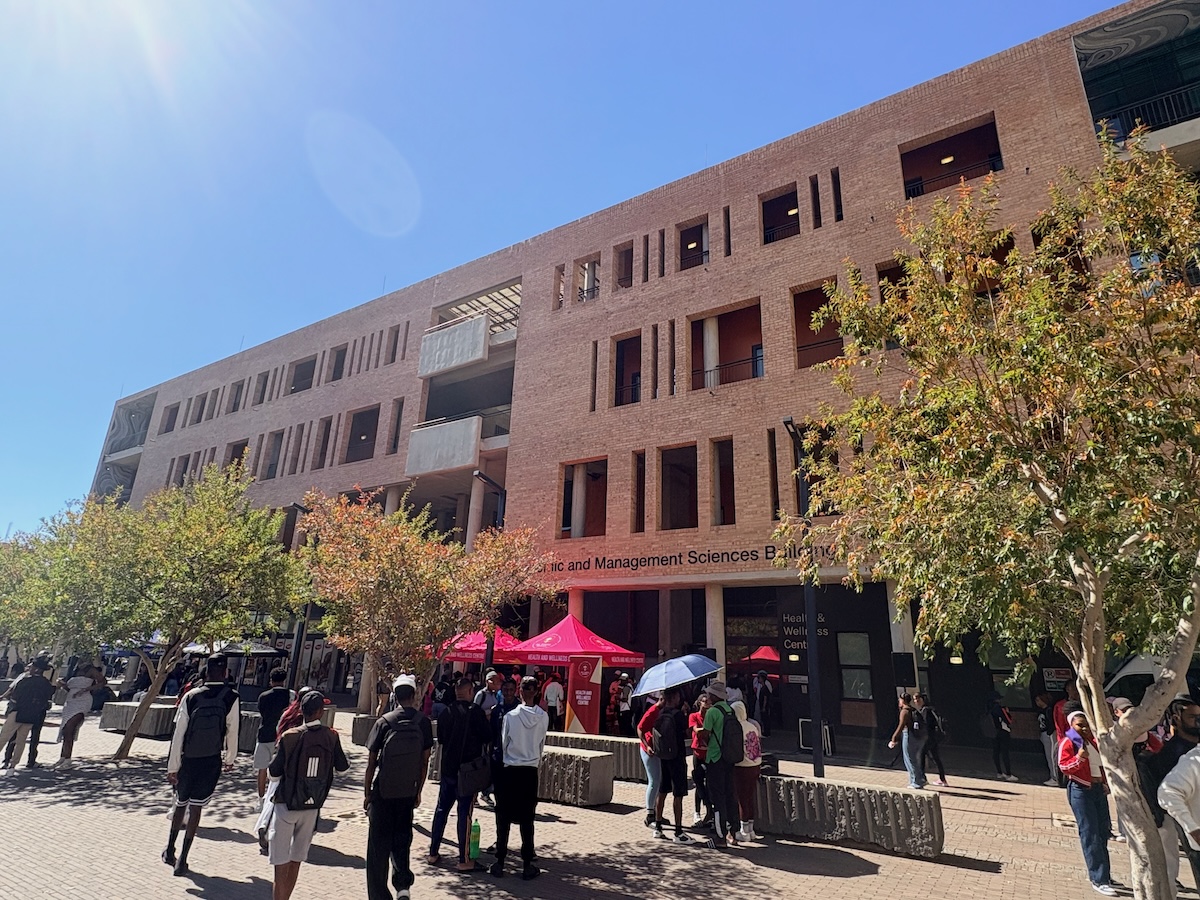 Students in University Square outside the Economic and Management Sciences Building at Sol Plaatje University.