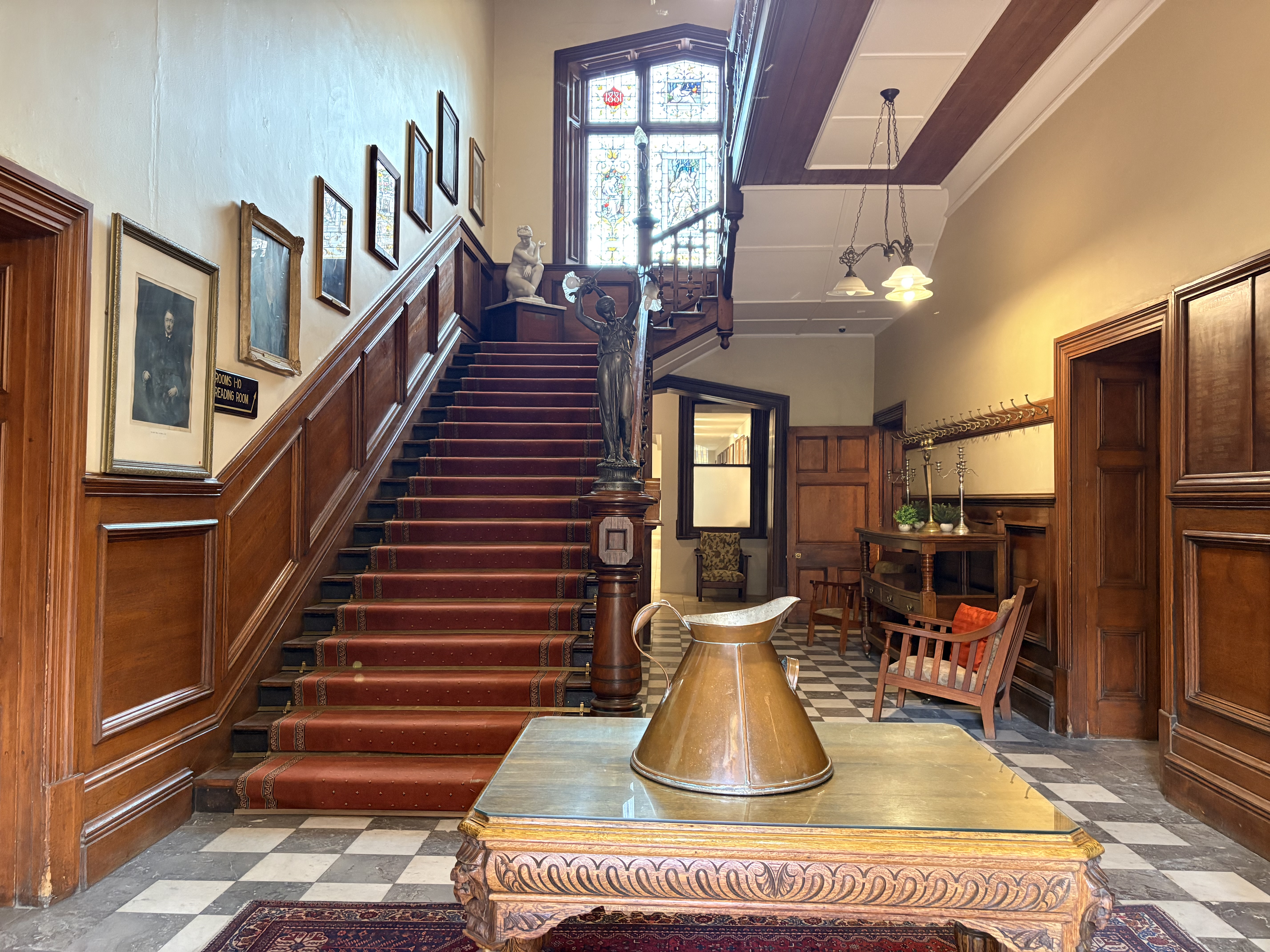 The magnificent double bend in the timber staircase, viewed from the ground floor.