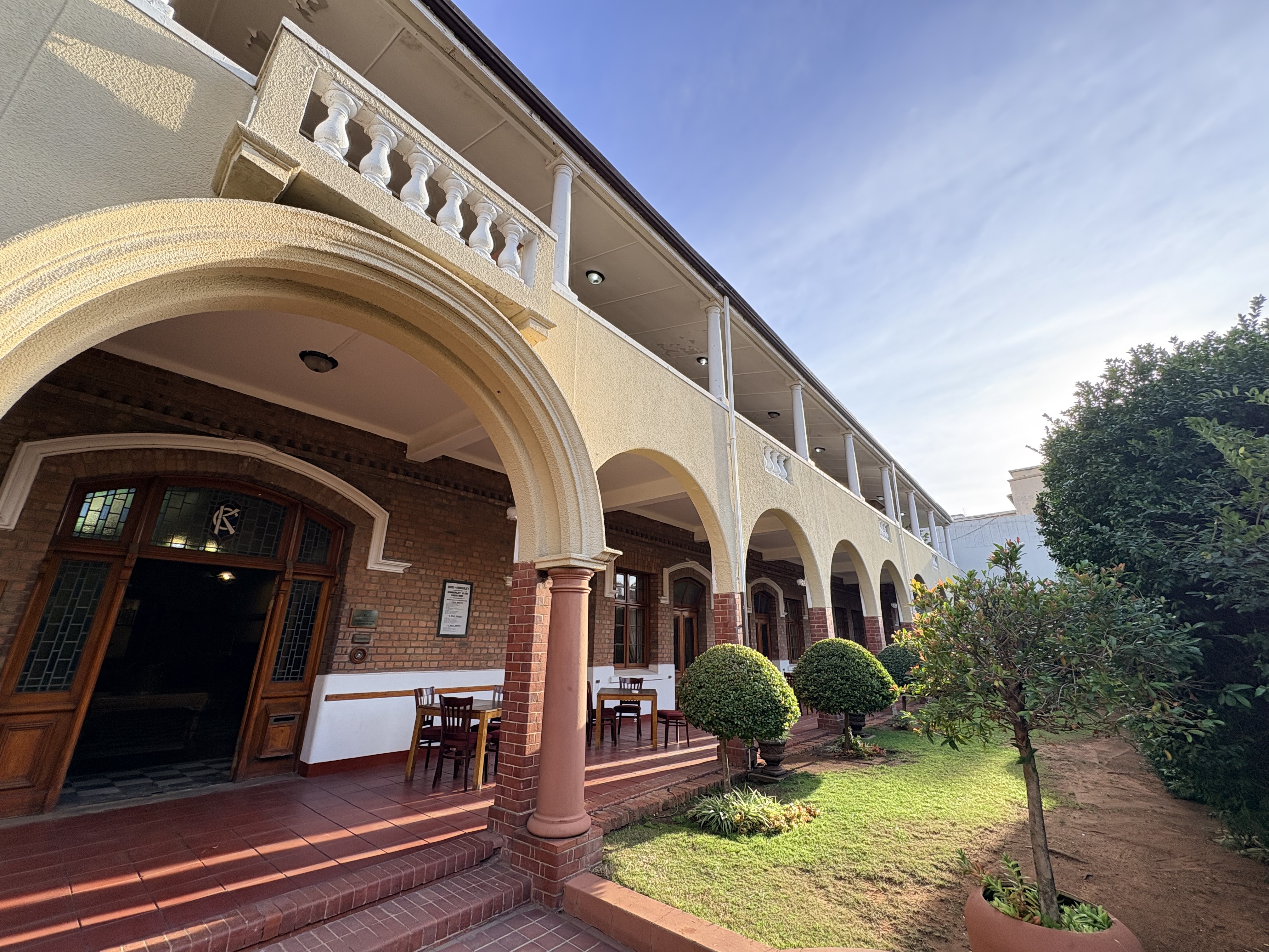 Long arched verandah overlooking one of the landscaped gardens within the Kimberley Club complex.