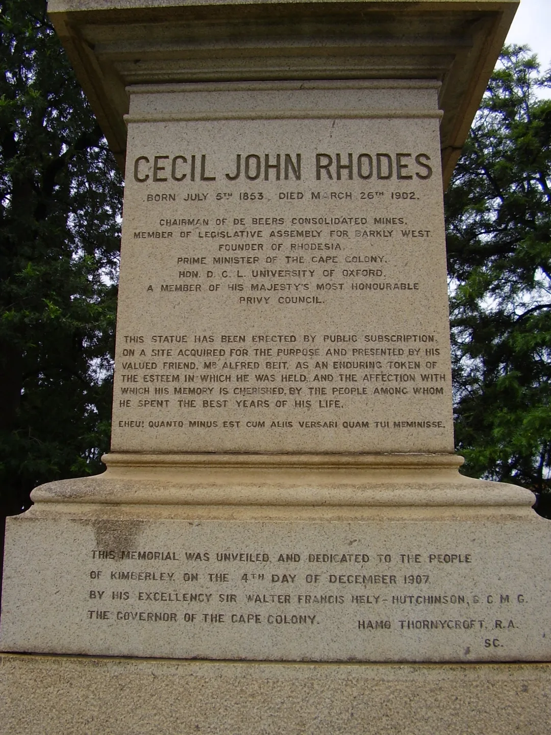 Inscription carved into the granite plinth of the Cecil Rhodes equestrian monument in Kimberley.