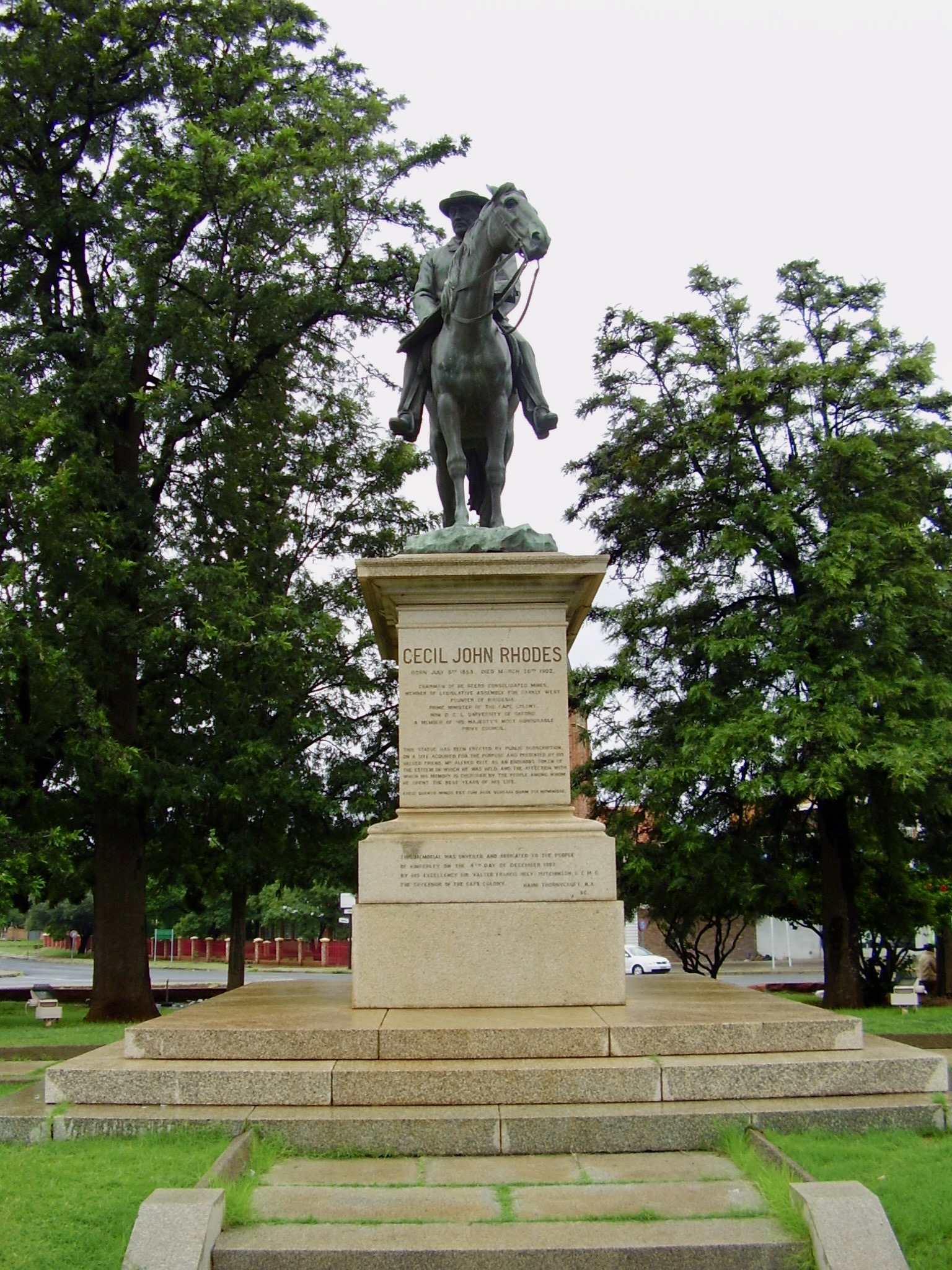Front view of the Cecil Rhodes equestrian monument in Kimberley showing the bronze horse and rider on a large granite plinth.
