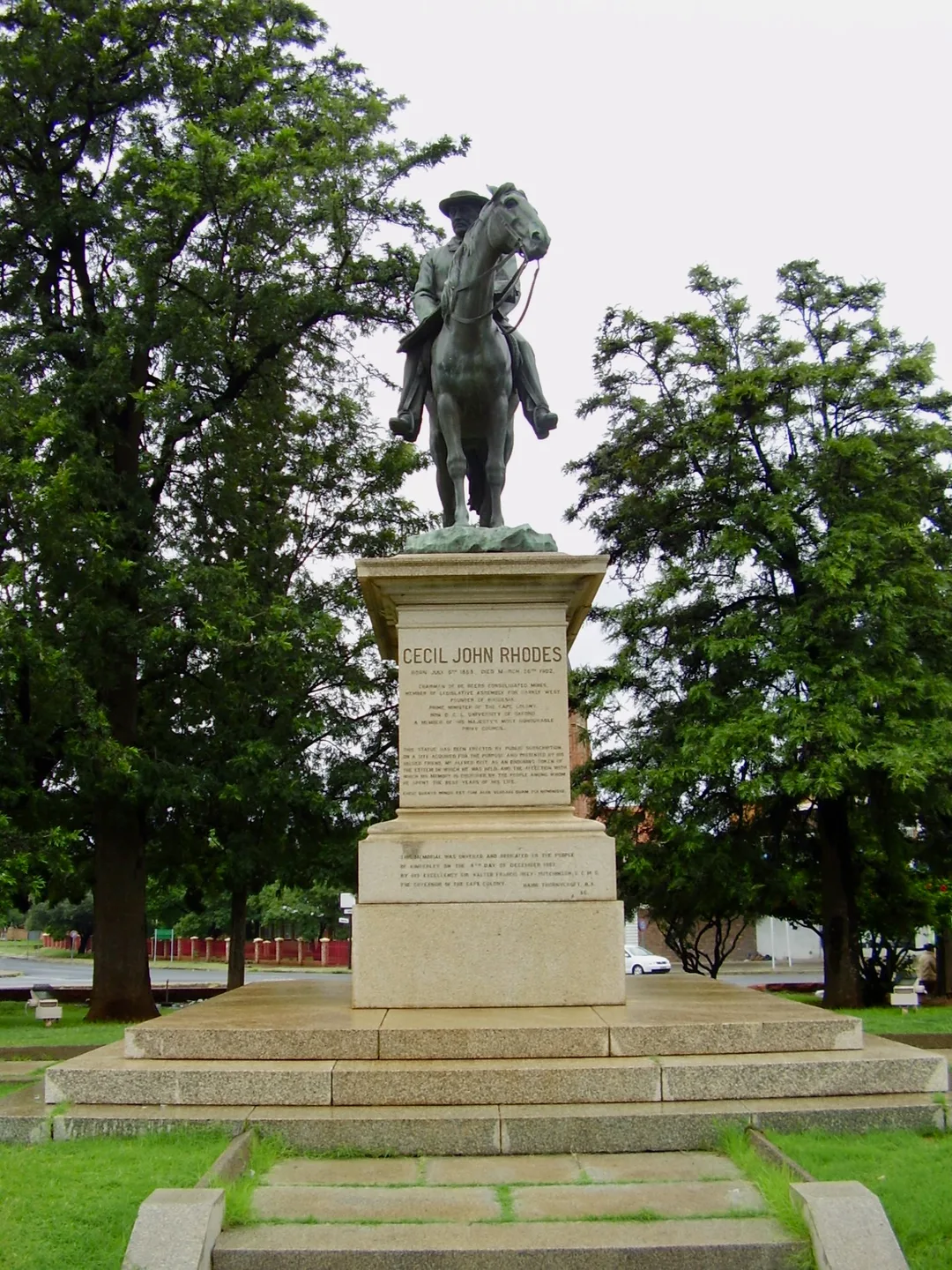 Front view of the Cecil Rhodes equestrian monument in Kimberley showing the bronze horse and rider on a large granite plinth.