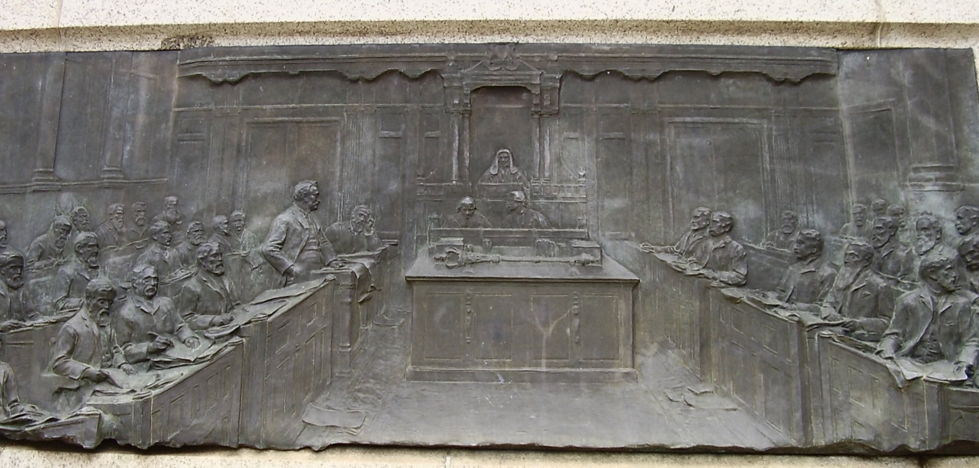 Bronze relief panel on the Cecil Rhodes monument in Kimberley showing Rhodes addressing members of the Cape Parliament.