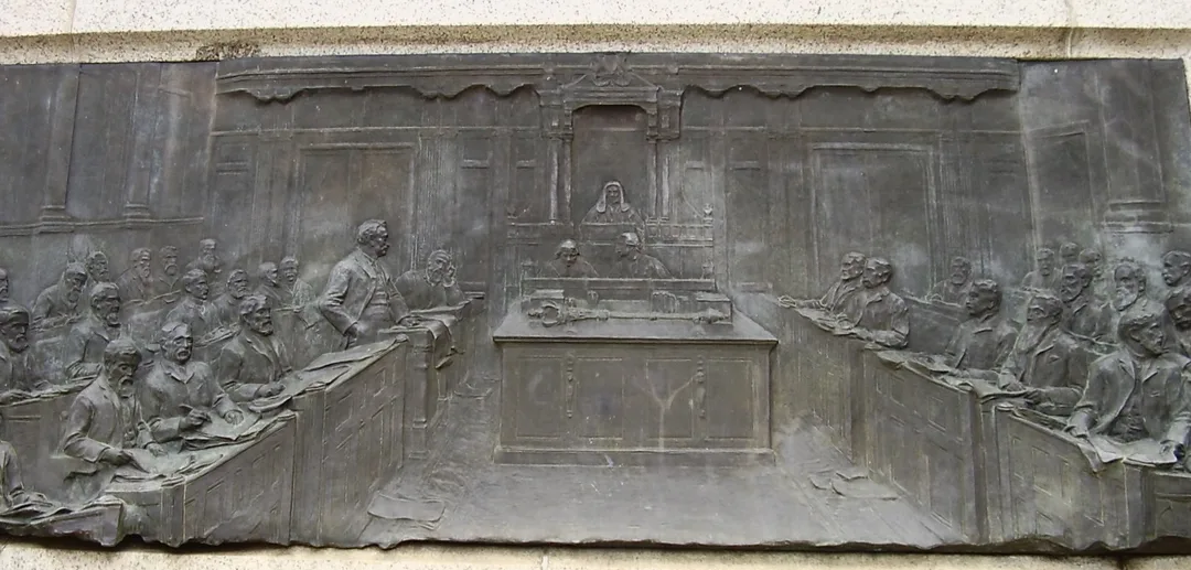 Bronze relief panel on the Cecil Rhodes monument in Kimberley showing Rhodes addressing members of the Cape Parliament.